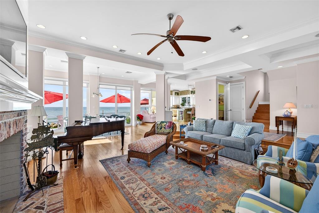 7152 Point Of Rocks Circle Sarasota, FL 34242 - Photo 17 of 88 a living room with furniture or couch and a ceiling fan