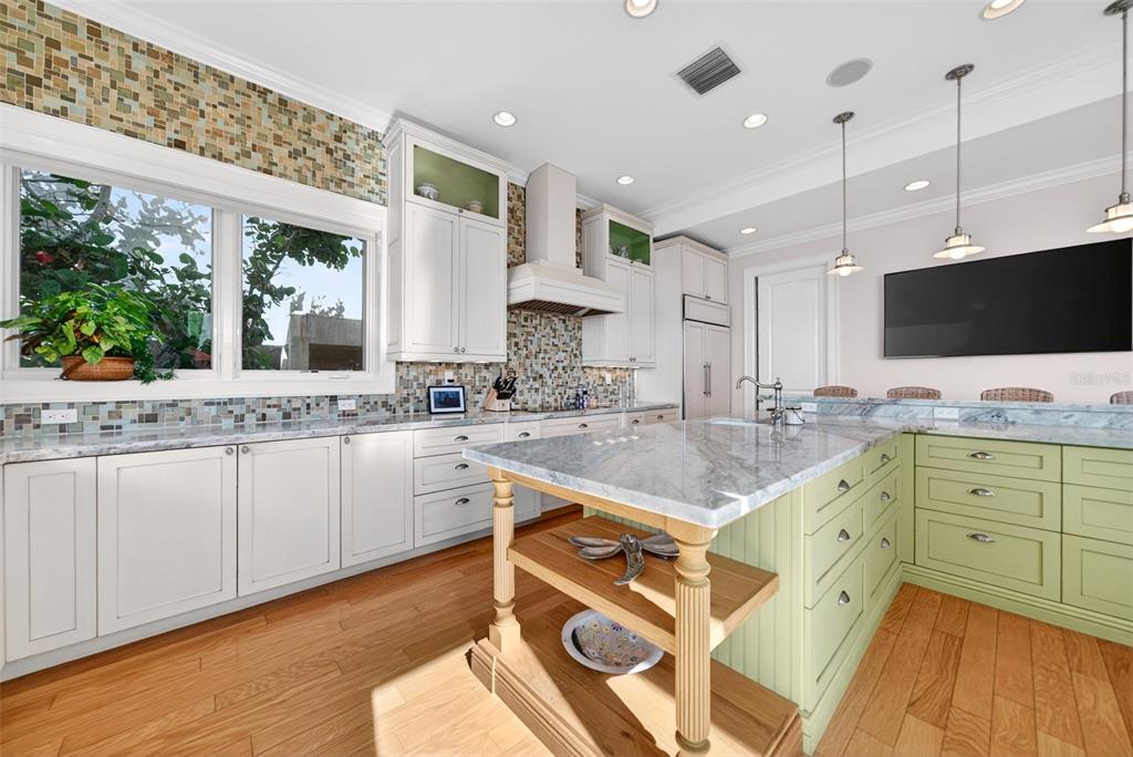 7152 Point Of Rocks Circle Sarasota, FL 34242 - Photo 30 of 88 a large white kitchen with a large window