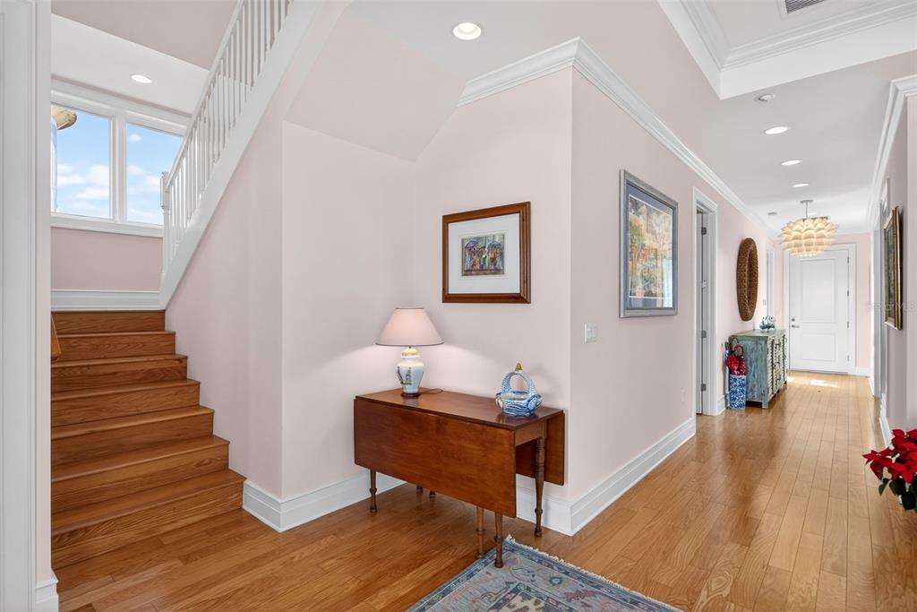 7152 Point Of Rocks Circle Sarasota, FL 34242 - Photo 32 of 88 a view of entryway and hall with wooden floor