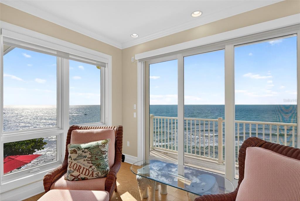 7152 Point Of Rocks Circle Sarasota, FL 34242 - Photo 41 of 88 a living room with furniture and a floor to ceiling window
