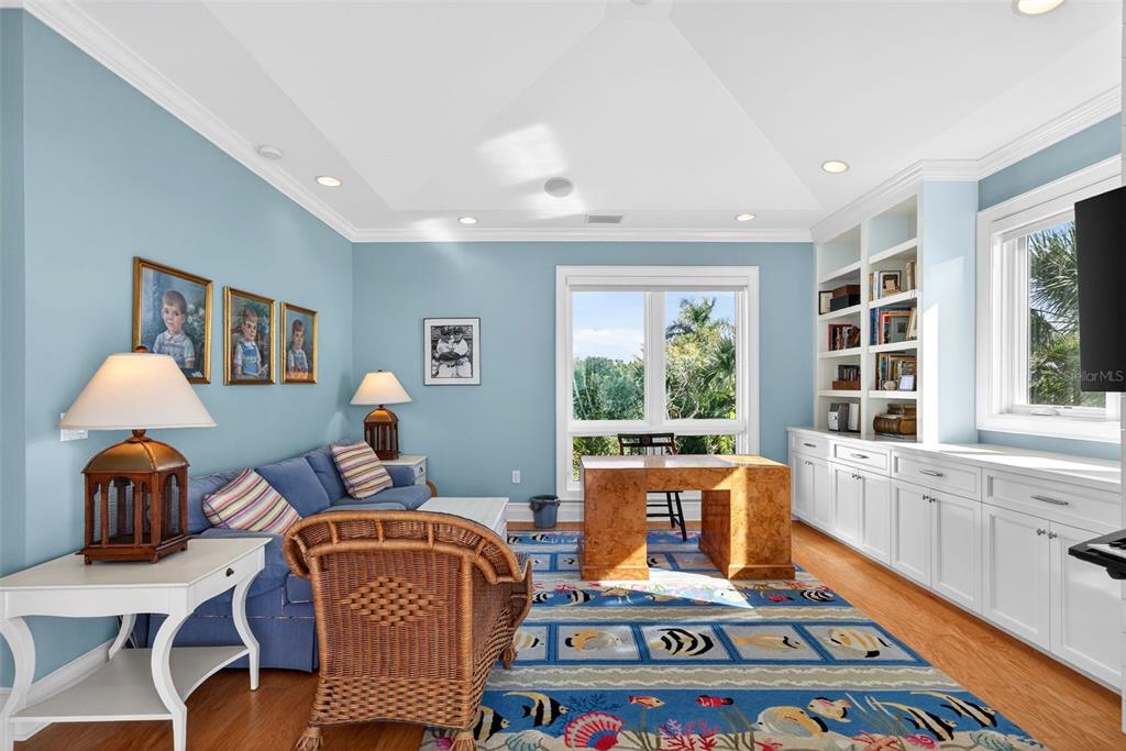7152 Point Of Rocks Circle Sarasota, FL 34242 - Photo 49 of 88 a living room with furniture and a window