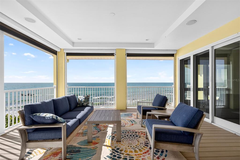 7152 Point Of Rocks Circle Sarasota, FL 34242 - Photo 52 of 88 a living room with furniture and a large window