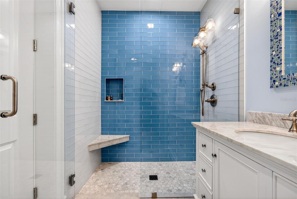 7152 Point Of Rocks Circle Sarasota, FL 34242 - Photo 62 of 88 a bathroom with a sink a toilet and shower