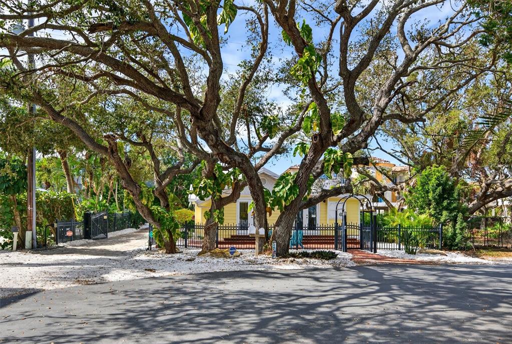 7152 Point Of Rocks Circle Sarasota, FL 34242 - Photo 75 of 88 a view of a house with a tree in the background