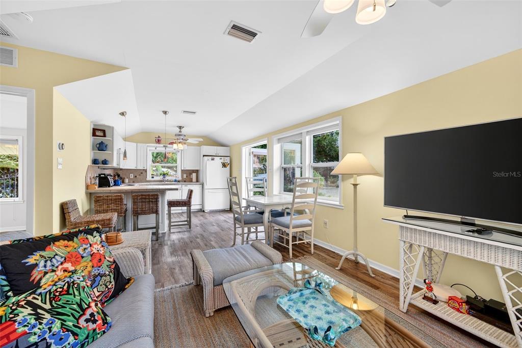 7152 Point Of Rocks Circle Sarasota, FL 34242 - Photo 82 of 88 a living room with furniture and a flat screen tv