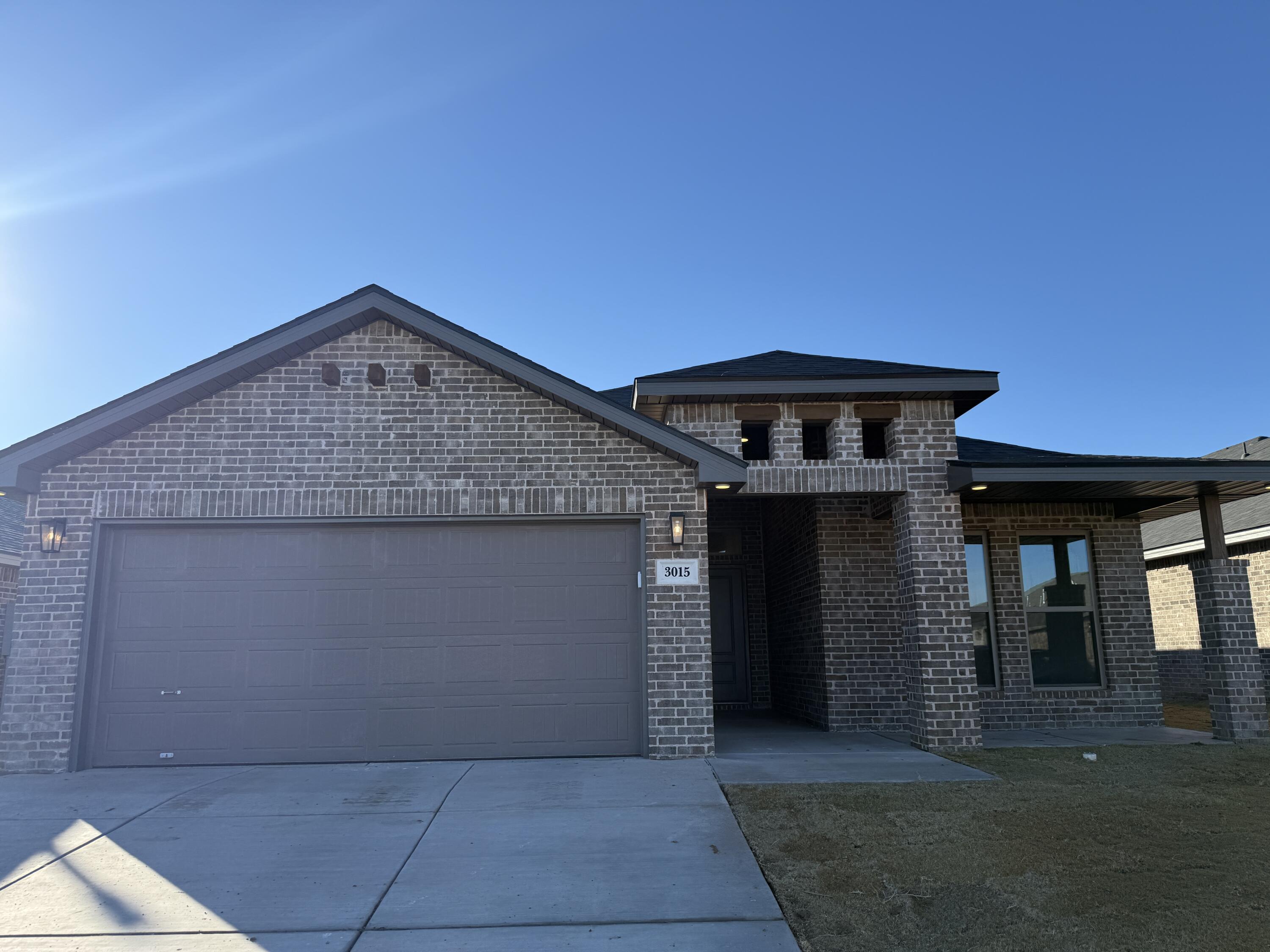 3015 138th Place Lubbock, TX 79423 - Photo 1 of 13 a front view of a house