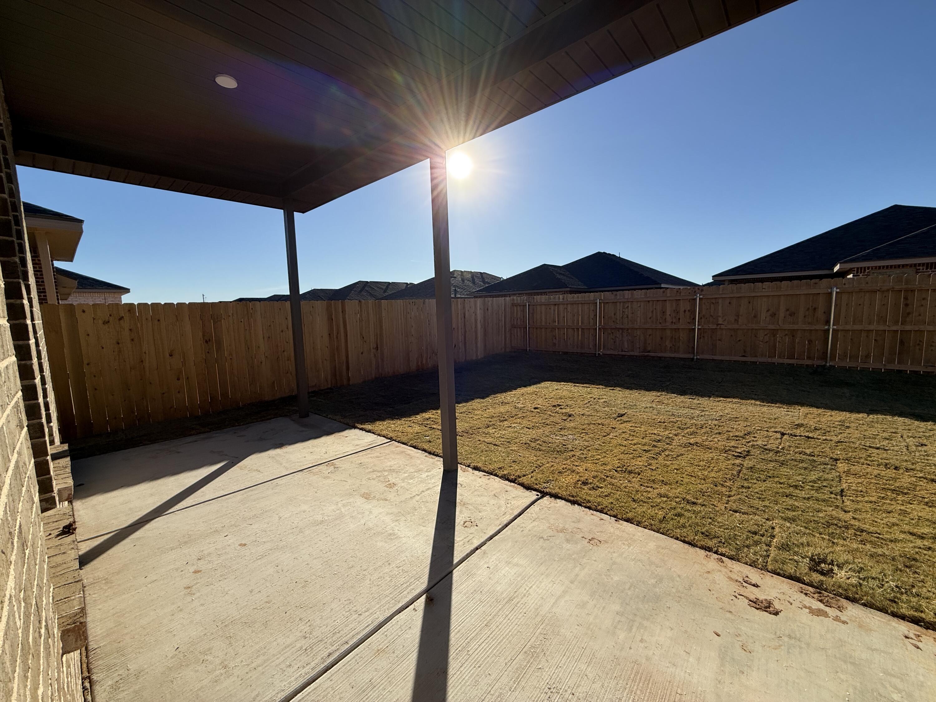 3015 138th Place Lubbock, TX 79423 - Photo 13 of 13 a view of a backyard of the house
