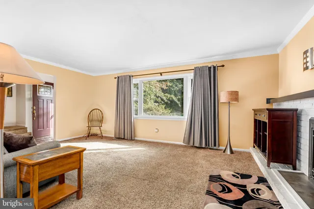 a kitchen with stainless steel appliances kitchen island granite countertop a sink and cabinets