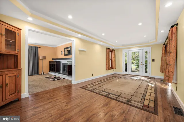 a balcony with furniture and a window