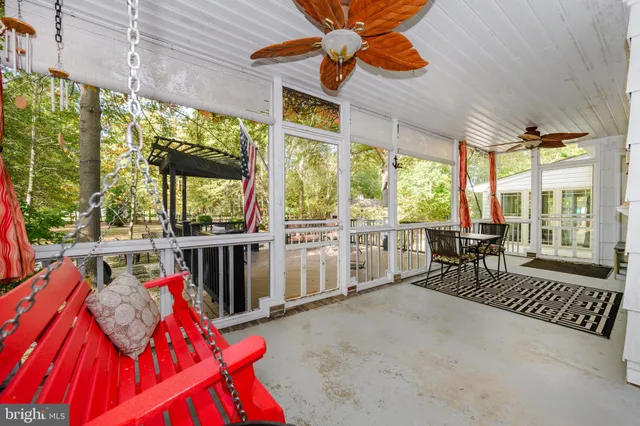 a kitchen with a sink a stove and a refrigerator