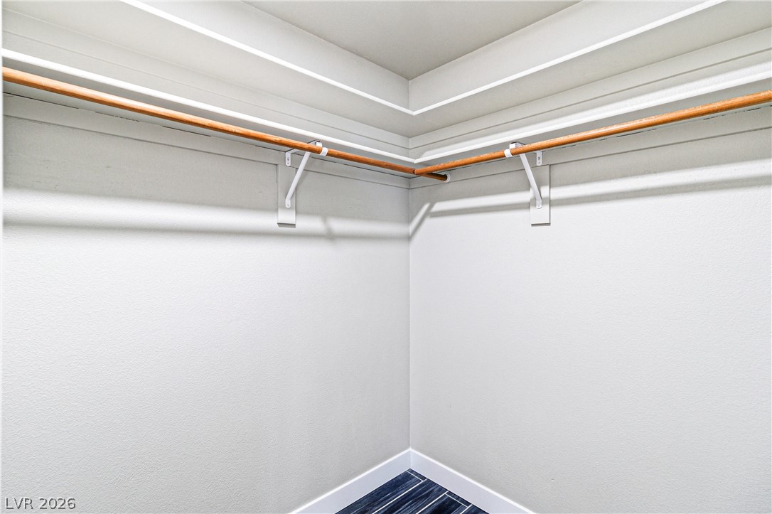 9523 Observer Street Las Vegas, NV 89123 - Photo 28 of 42 Ample closet space with sturdy rods for convenient storage.