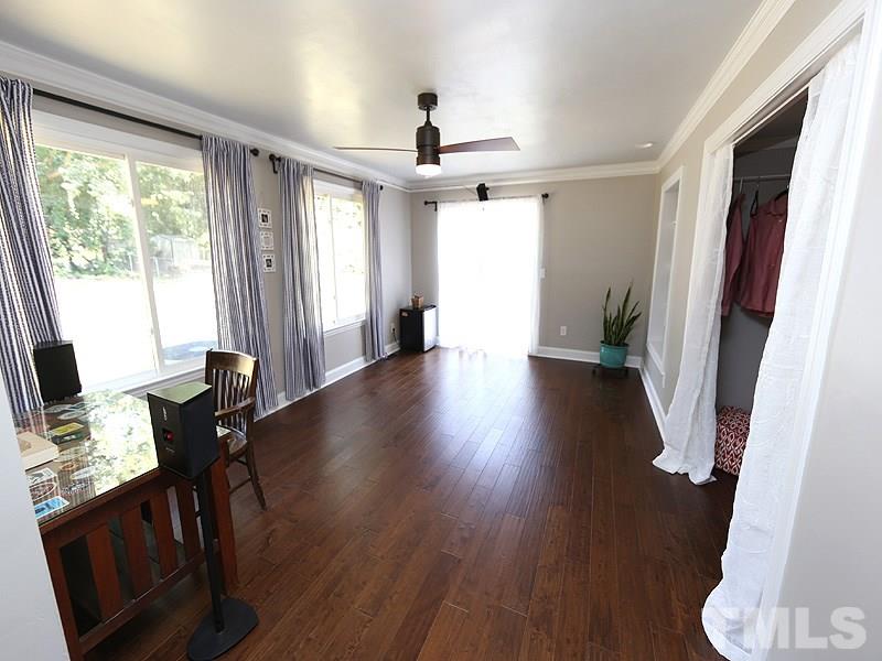 2811 Fordham Lane Raleigh, NC 27604 - Photo 13 of 17 HUGE bedroom with glass doors onto a deck. This home has a true, split bedroom plan.
