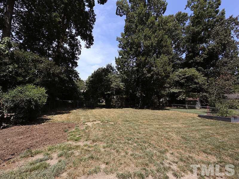 2811 Fordham Lane Raleigh, NC 27604 - Photo 15 of 17 Large, fenced back yard just awaiting your landscape expertise, or a great open space for kids or the dog to play.