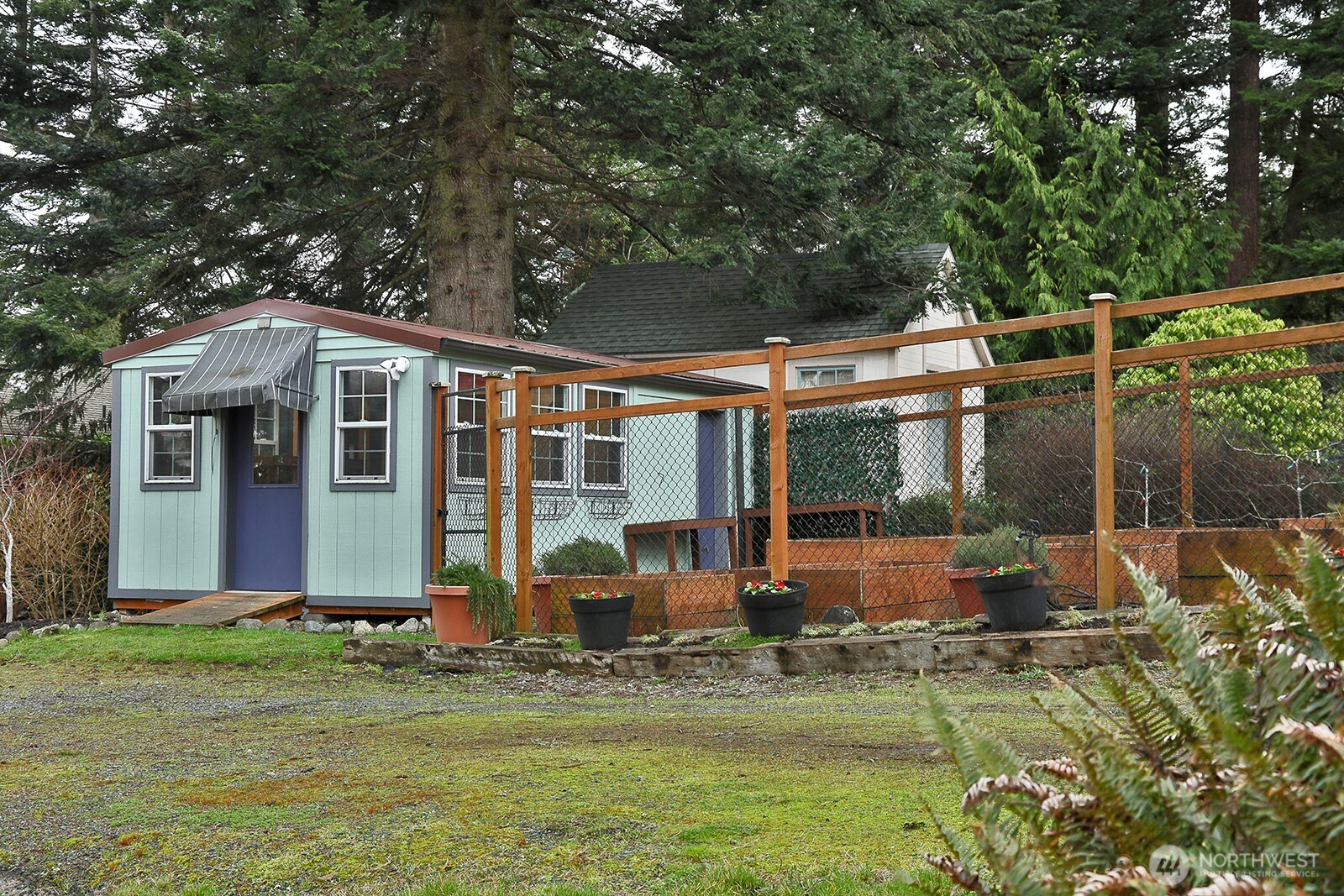 2999 Saratoga Road Langley, WA 98260 - Photo 28 of 40 a view of a house with backyard