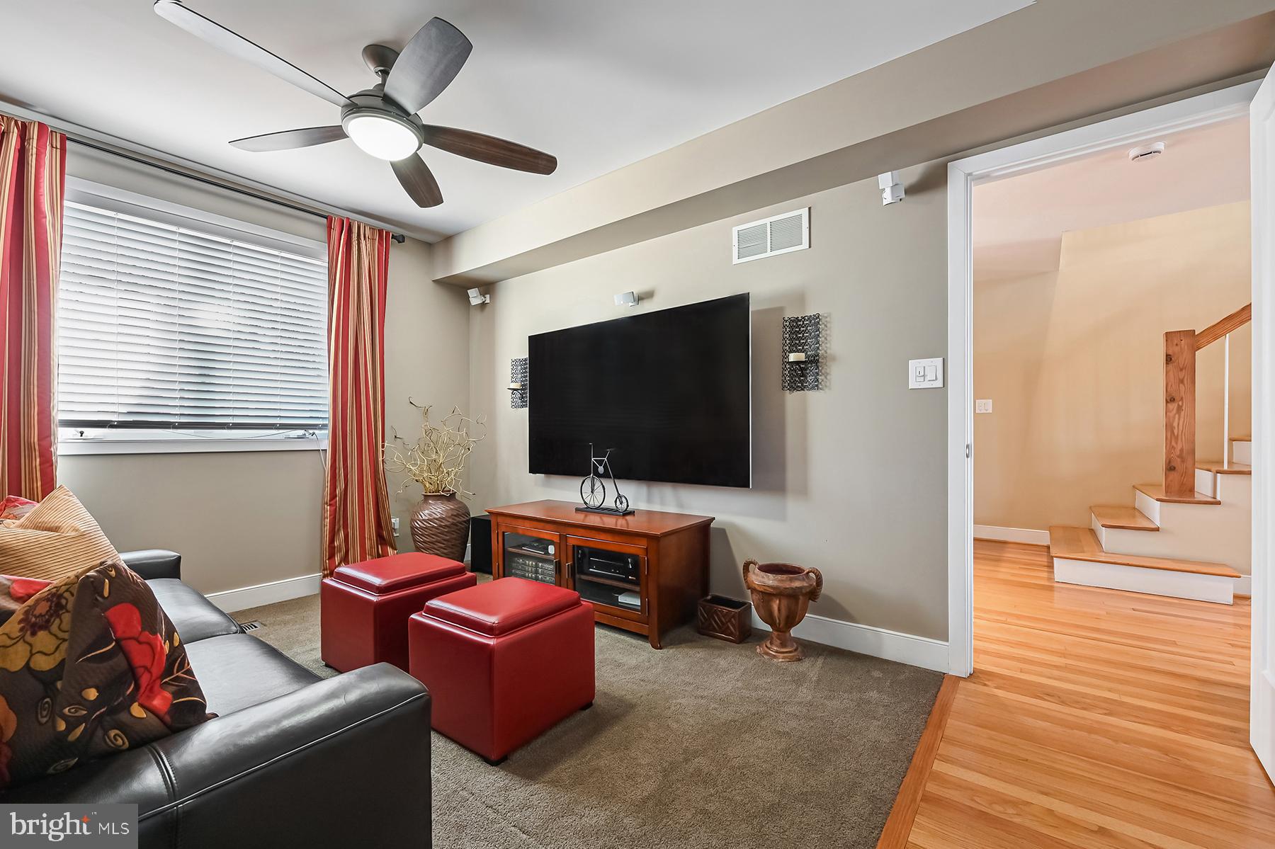 315 Cove Road Riva, MD 21140 - Photo 31 of 38 a living room with furniture and a flat screen tv