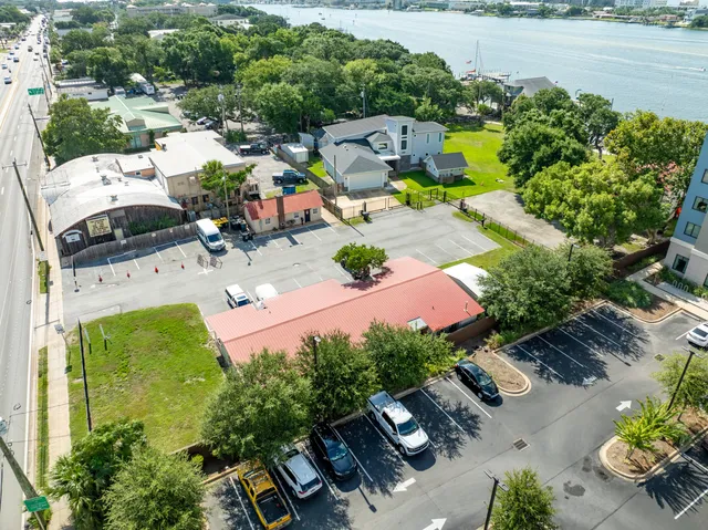 a aerial view of a house with a yard