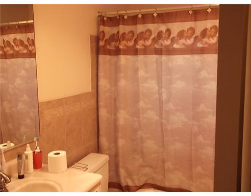 1979 Park Place Boca Raton, FL 33486 - Photo 6 of 10 a bathroom with a shower and a sink