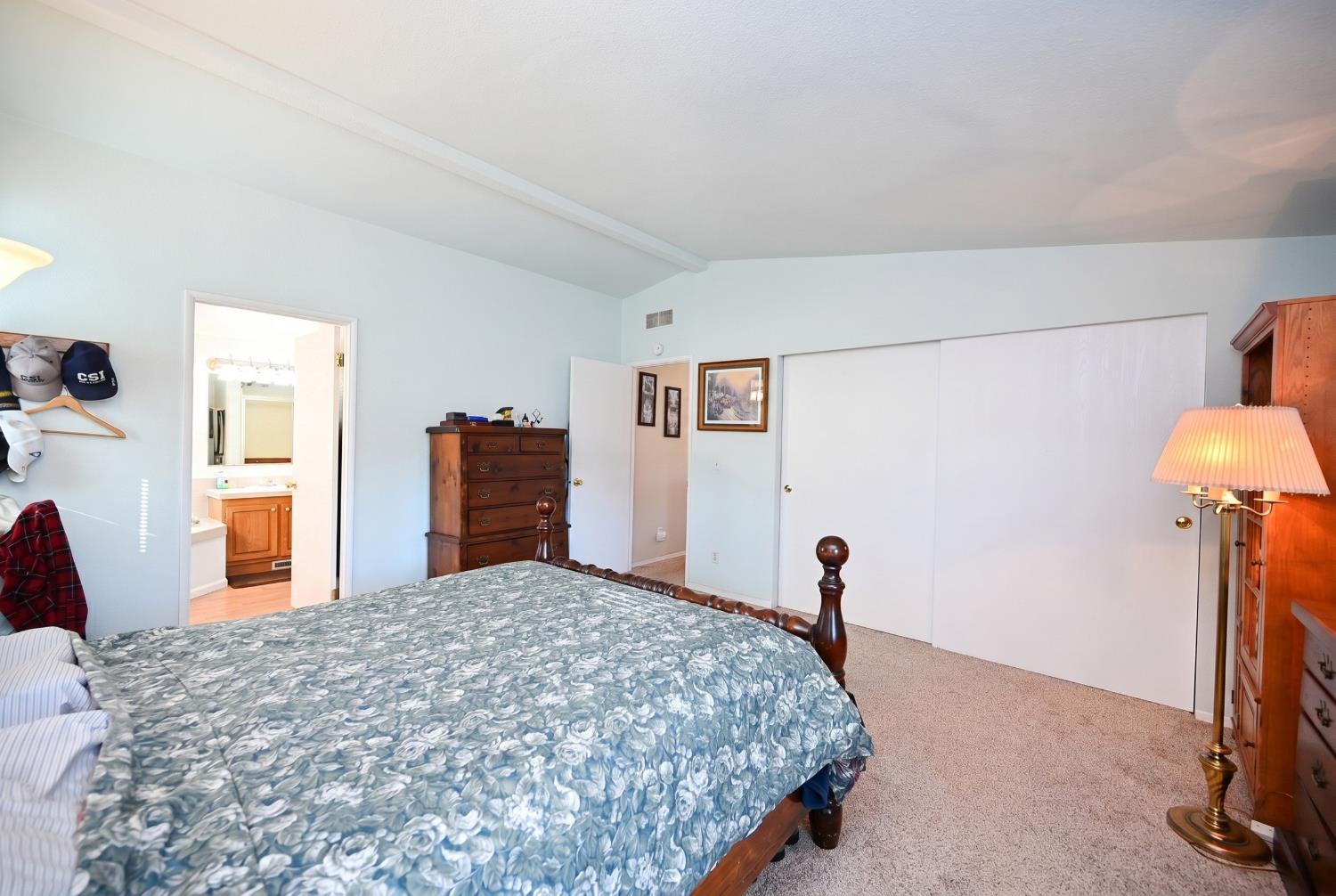 4360 Pleasant Valley Road Placerville, CA 95667 - Photo 49 of 71 a bedroom with a bed and a dresser in it