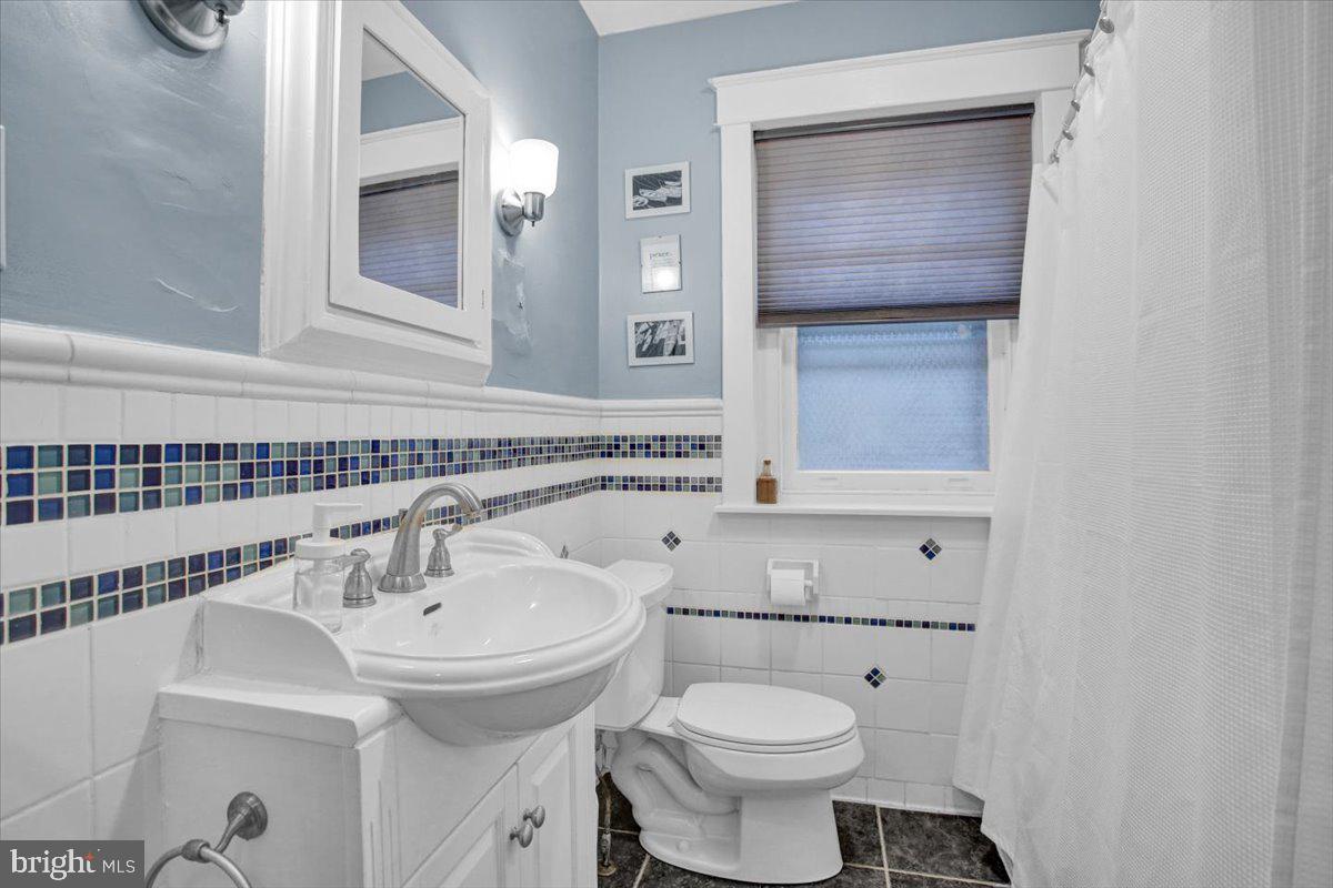 201 North Brobst Street Reading, PA 19607 - Photo 48 of 58 Full Bathroom with custom tile and new sconces