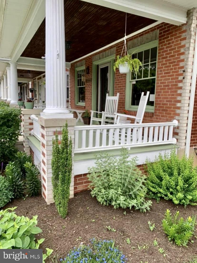 201 North Brobst Street Reading, PA 19607 - Photo 5 of 58 Side of porch and landscaping