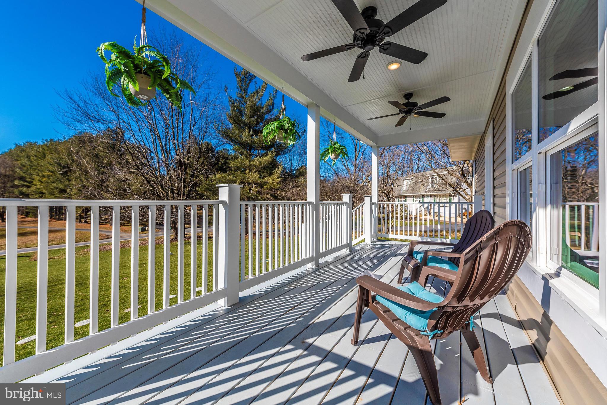 5411 Sidney Road Mount Airy, MD 21771 - Photo 2 of 32 The large front porch with ceiling fans