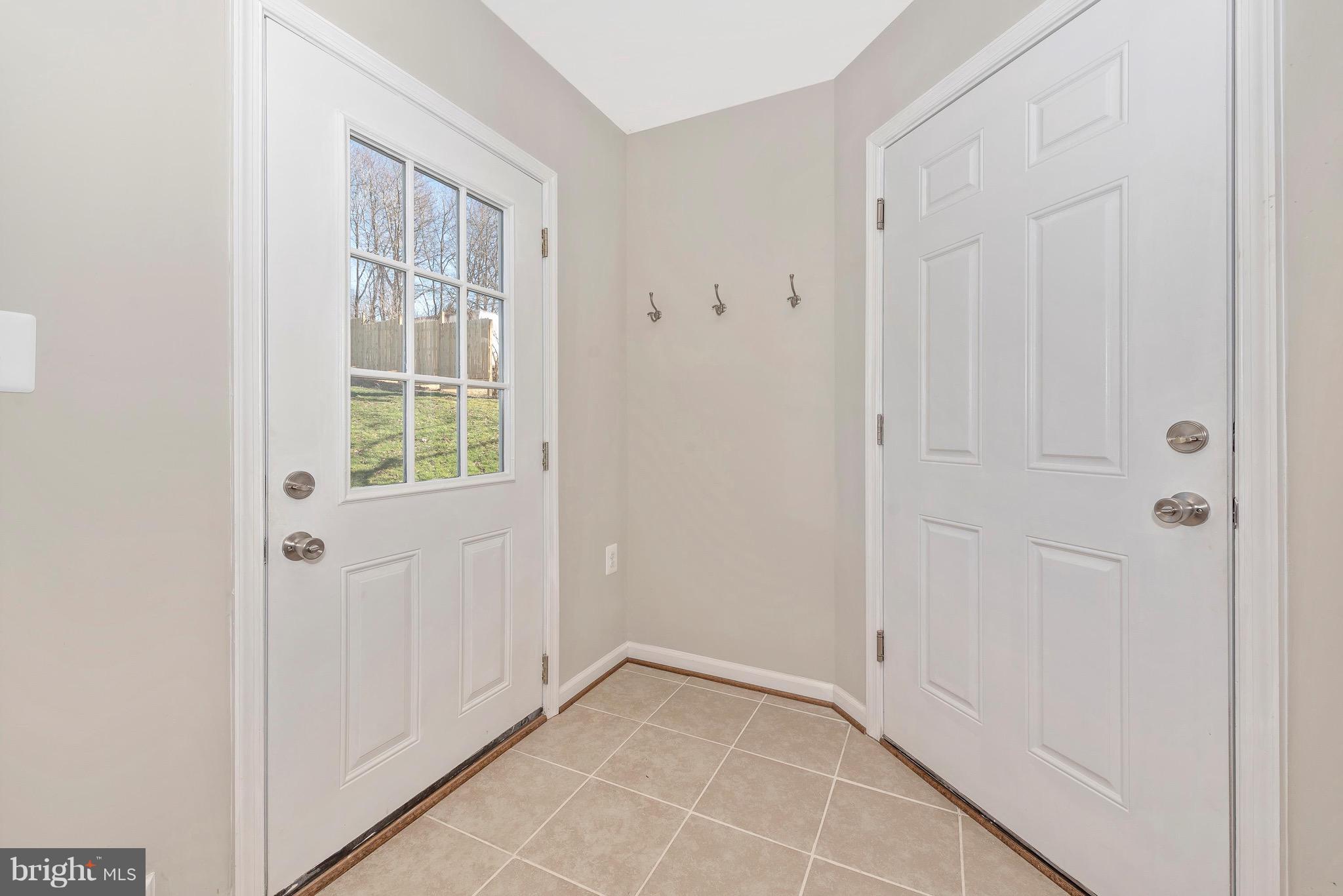 5411 Sidney Road Mount Airy, MD 21771 - Photo 14 of 32 Mudroom with access to garage and backyard.