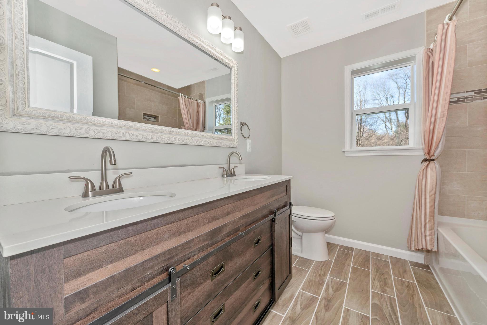 5411 Sidney Road Mount Airy, MD 21771 - Photo 23 of 32 Upper Hall Bath with double vanity.