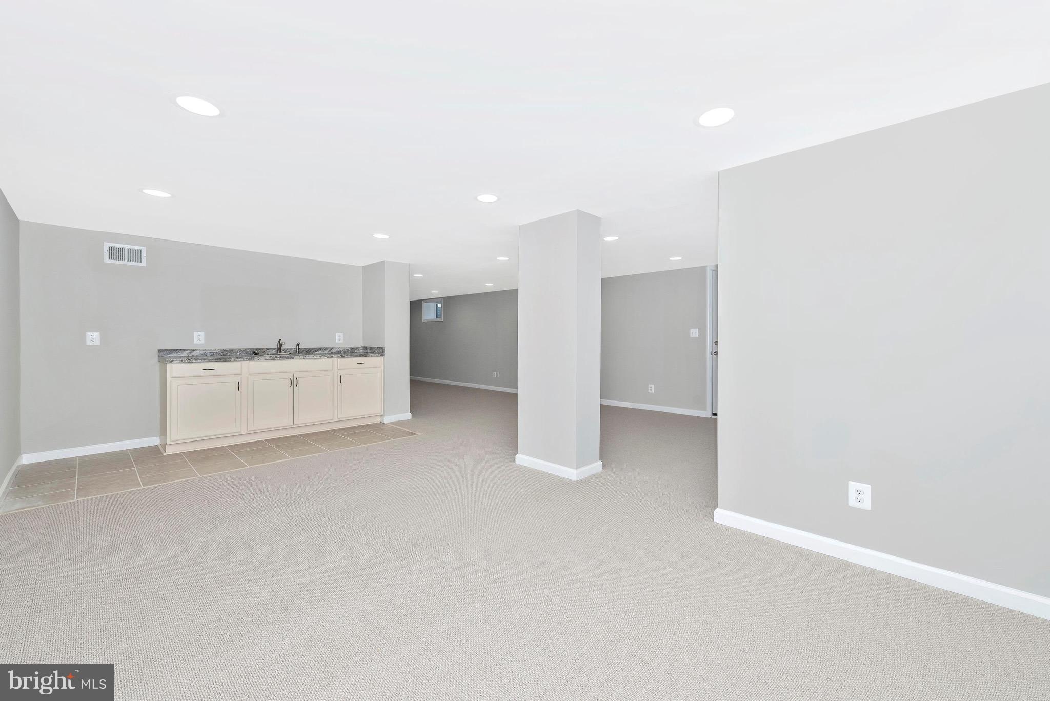 5411 Sidney Road Mount Airy, MD 21771 - Photo 26 of 32 Large open basement with bar.