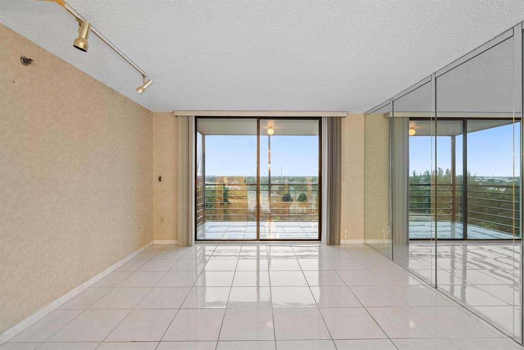 1200 St Charles Place, Unit PH7 Pembroke Pines, FL 33026 - Photo 13 of 28 a view of an empty room and window