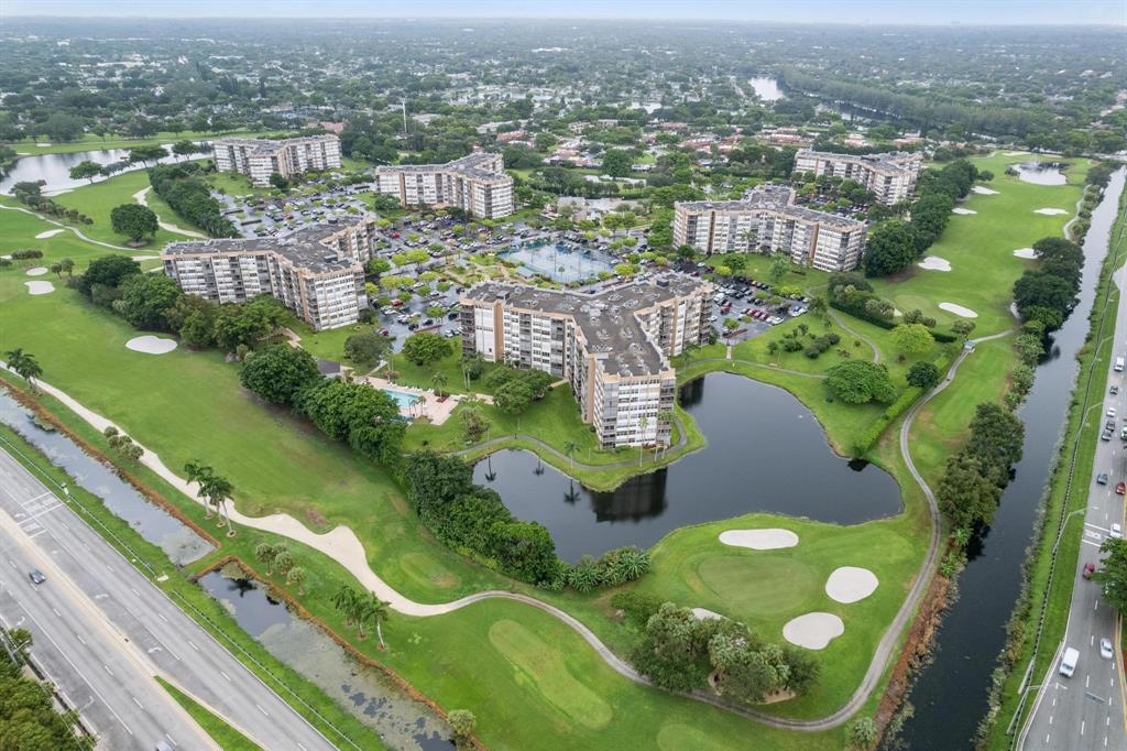 1200 St Charles Place, Unit PH7 Pembroke Pines, FL 33026 - Photo 28 of 28 an aerial view of a residential houses with outdoor space and a lake view