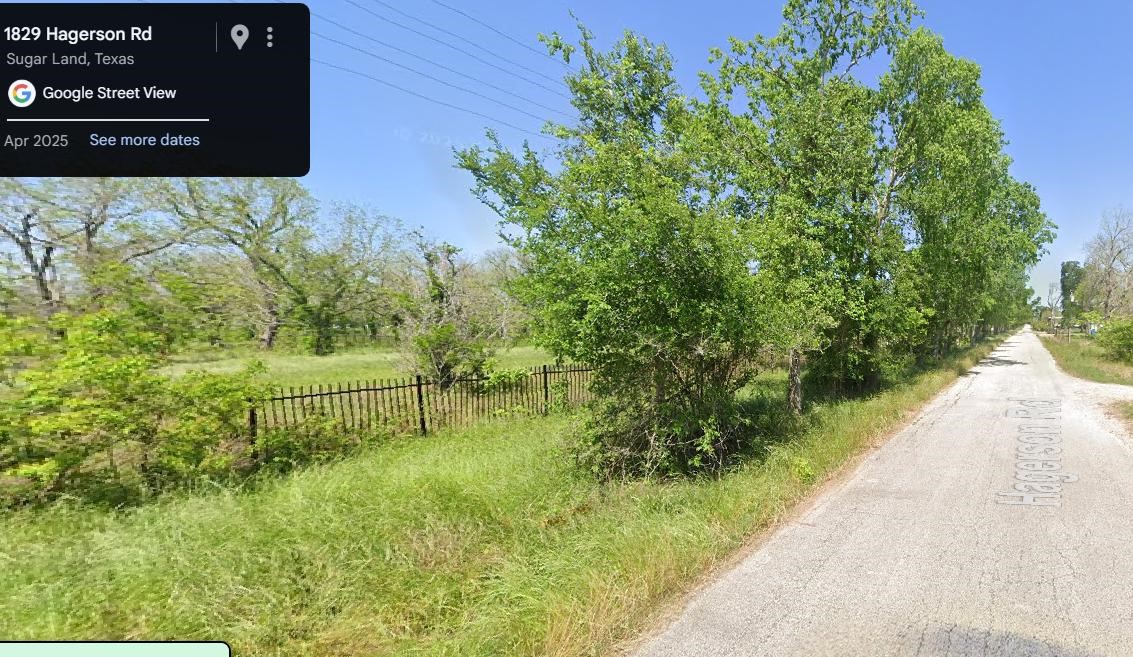 1900 Hagerson Road Sugar Land, TX 77479 - Photo 4 of 5 a view of a bench in backyard of a building