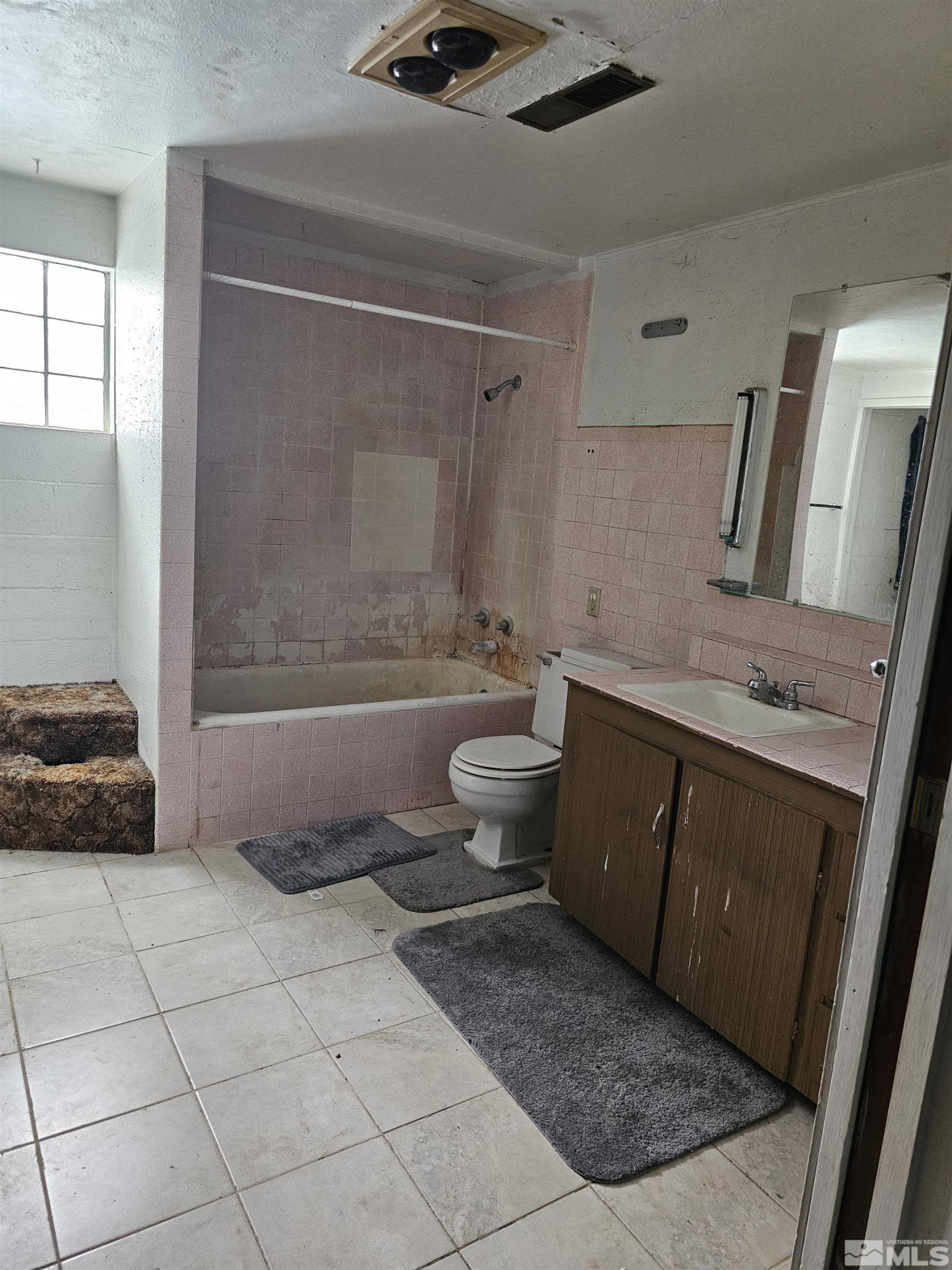 116 English Street Hawthorne, NV 89415 - Photo 13 of 18 a bathroom with a sink a toilet and shower