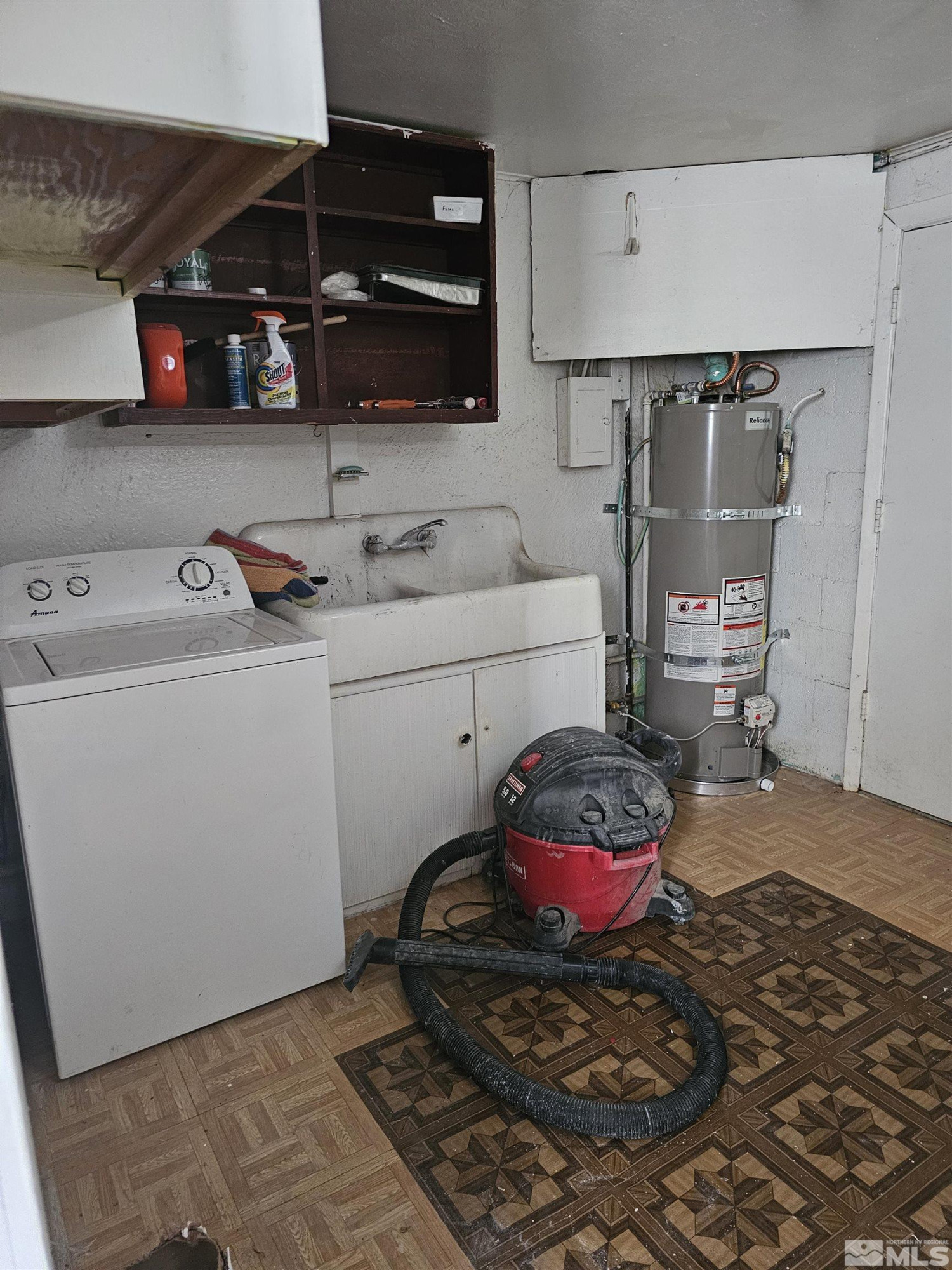 116 English Street Hawthorne, NV 89415 - Photo 15 of 18 a bathroom with a sink and a washing machine