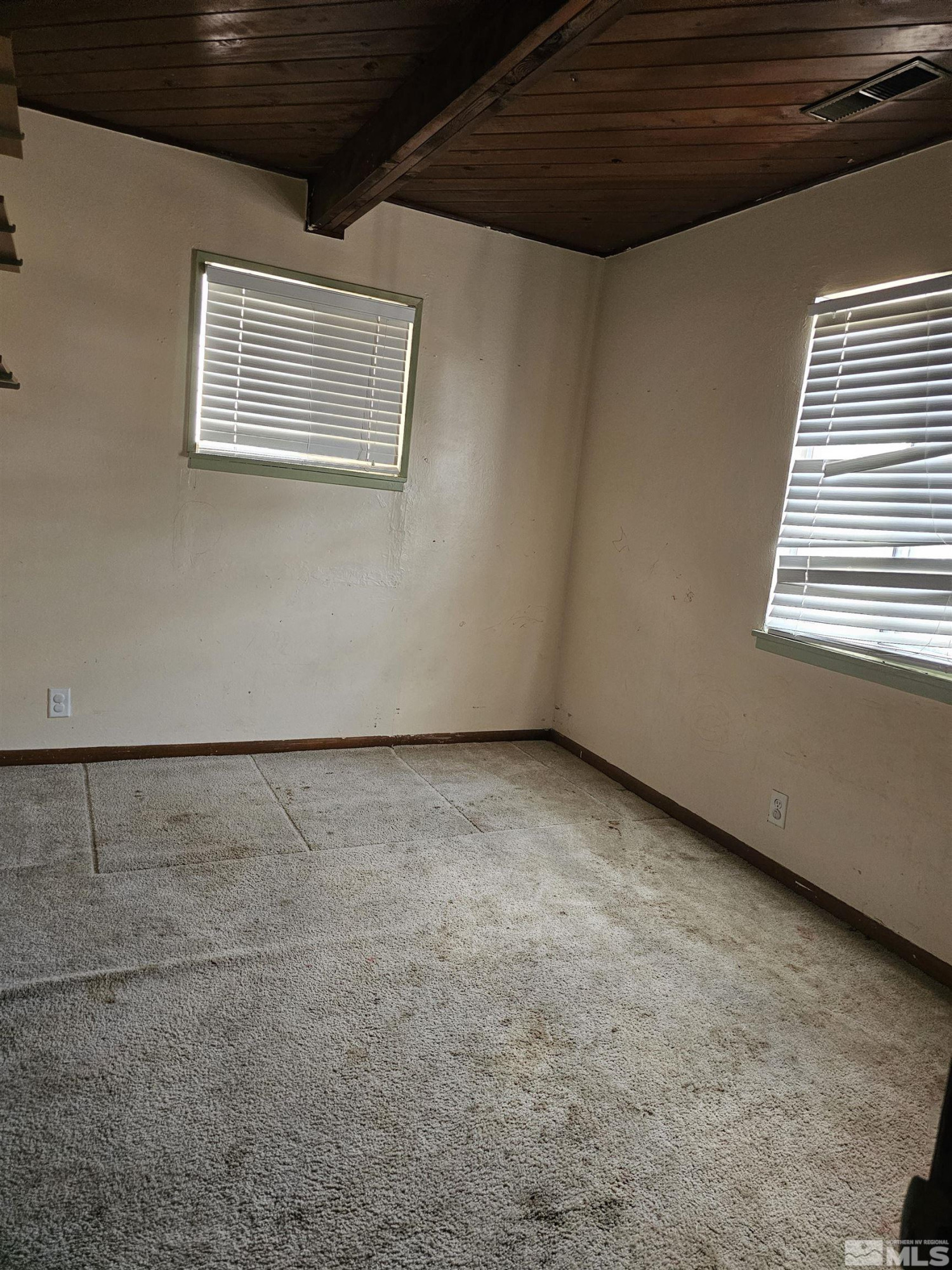 116 English Street Hawthorne, NV 89415 - Photo 9 of 18 a view of an empty room with a window