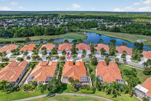 an aerial view of house with yard
