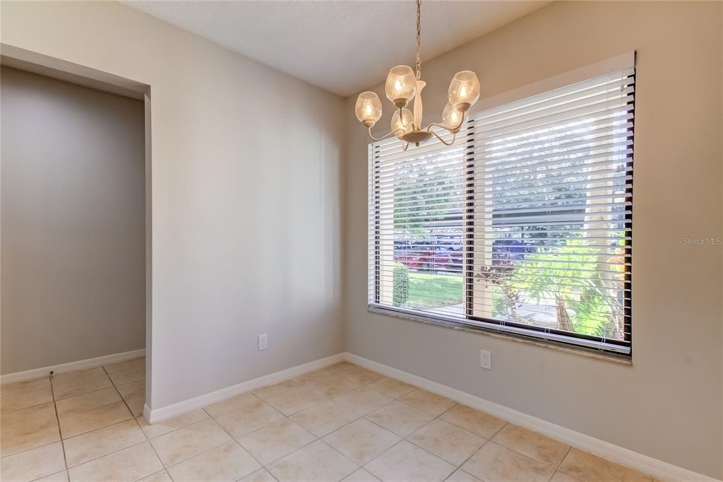 1801 East Lake Road South, Unit 12C Palm Harbor, FL 34685 - Photo 16 of 24 a view of livingroom with window