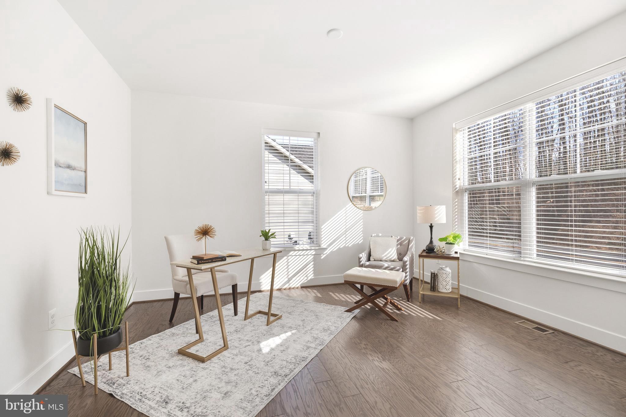 550 Broadneck Road Annapolis, MD 21409 - Photo 15 of 63 a living room with furniture and a large window