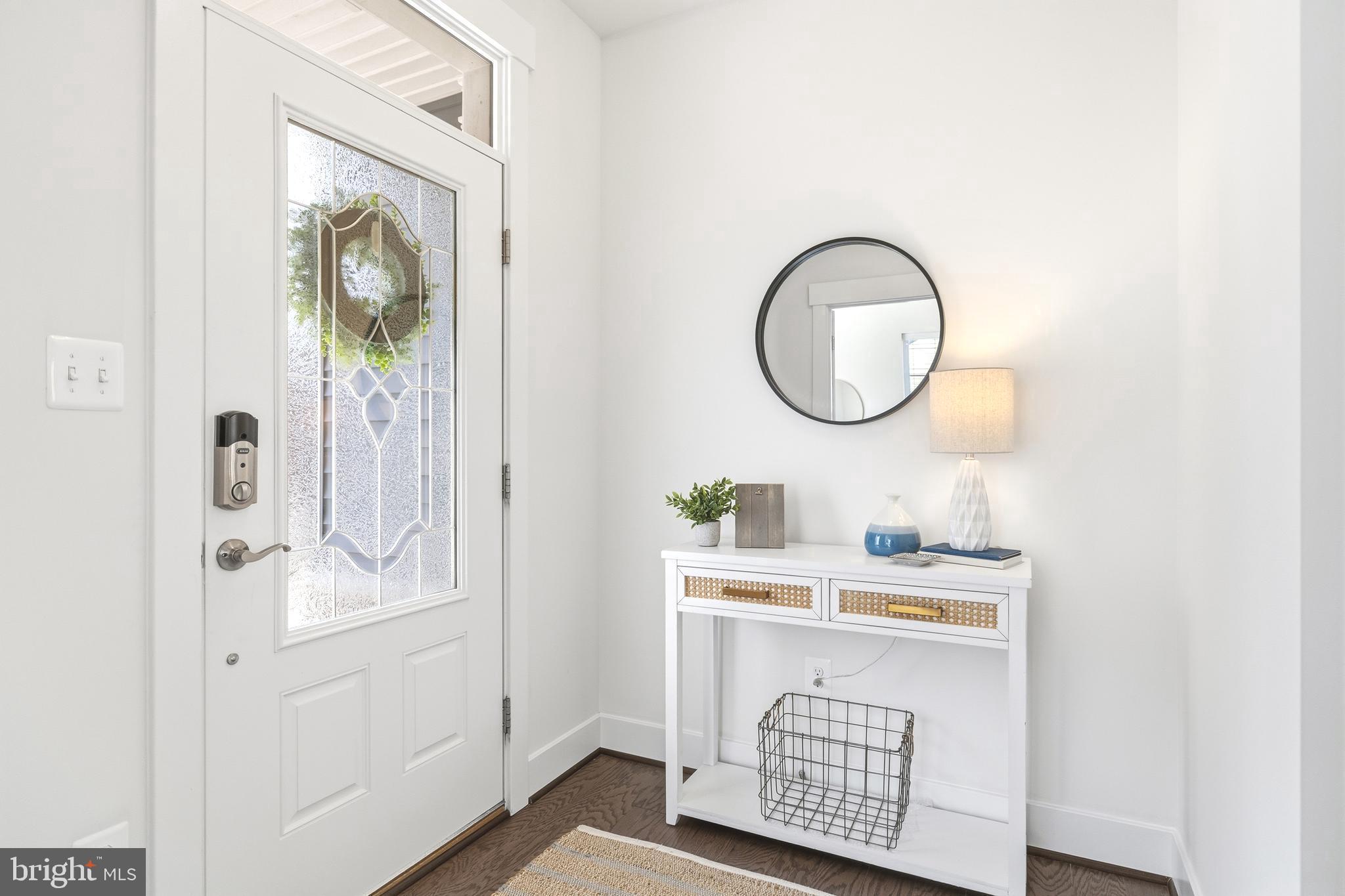 550 Broadneck Road Annapolis, MD 21409 - Photo 17 of 63 a bathroom with a sink a mirror and vanity