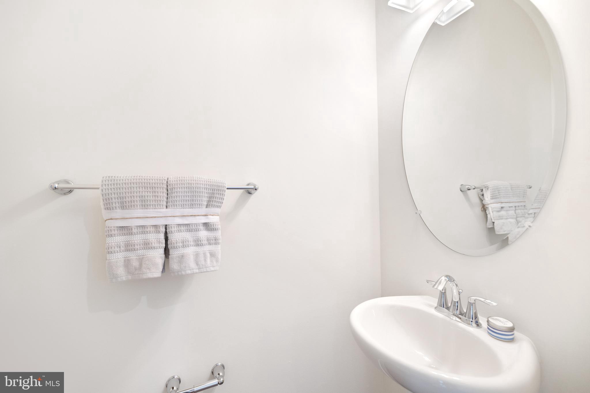 550 Broadneck Road Annapolis, MD 21409 - Photo 18 of 63 a bathroom with a sink and a mirror