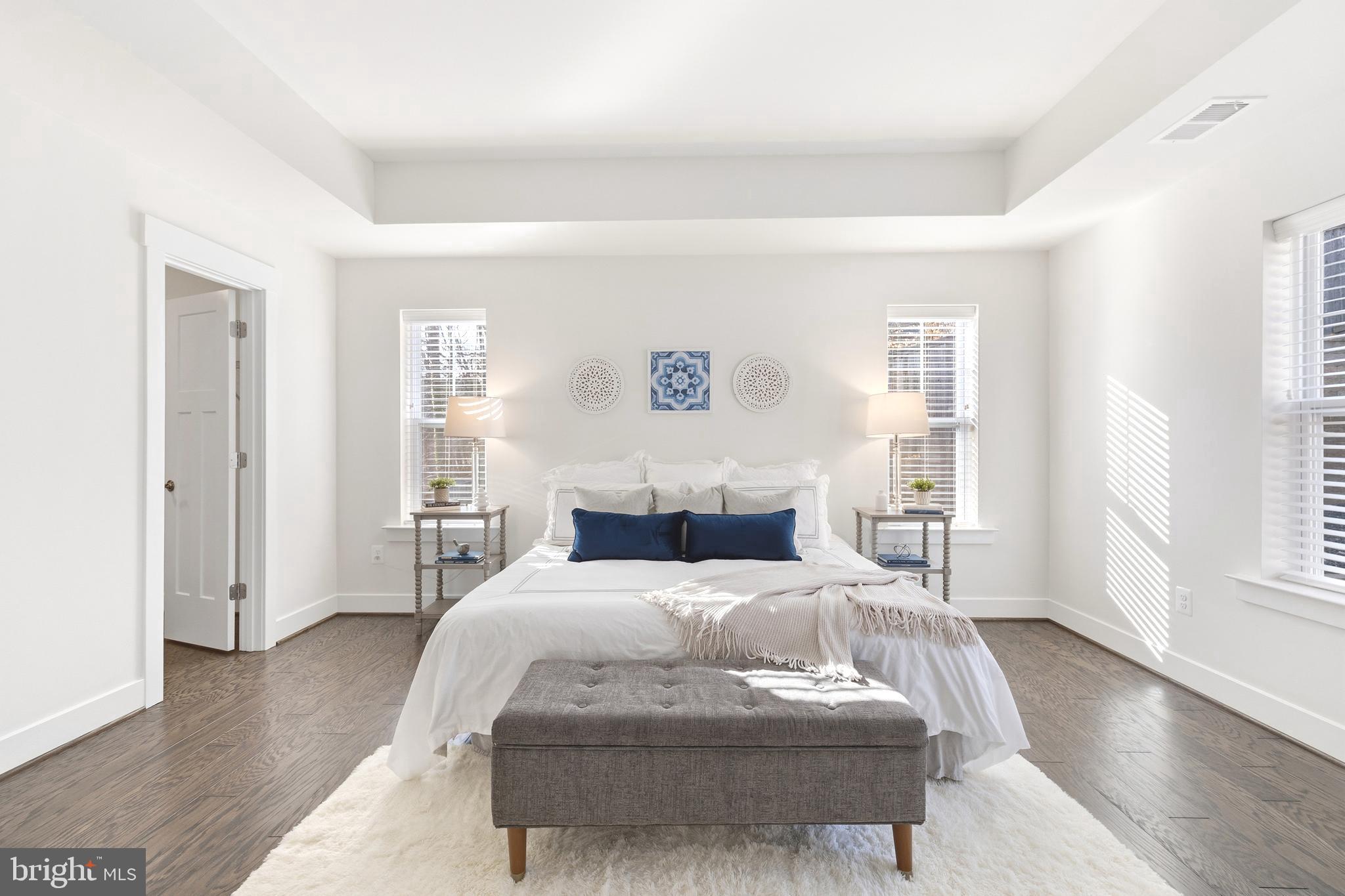 550 Broadneck Road Annapolis, MD 21409 - Photo 22 of 63 a bedroom with a bed and wooden floor