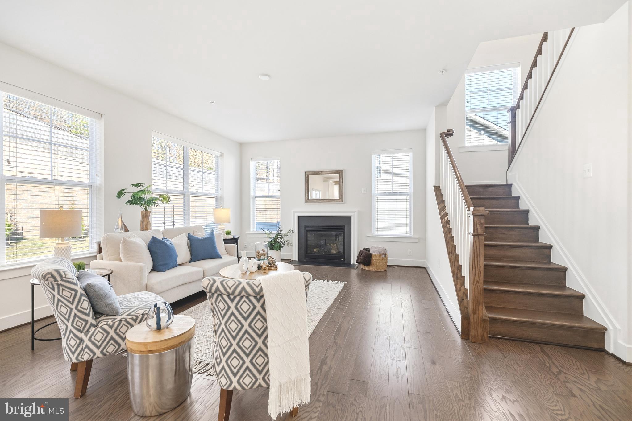 550 Broadneck Road Annapolis, MD 21409 - Photo 3 of 63 a living room with furniture and a fireplace