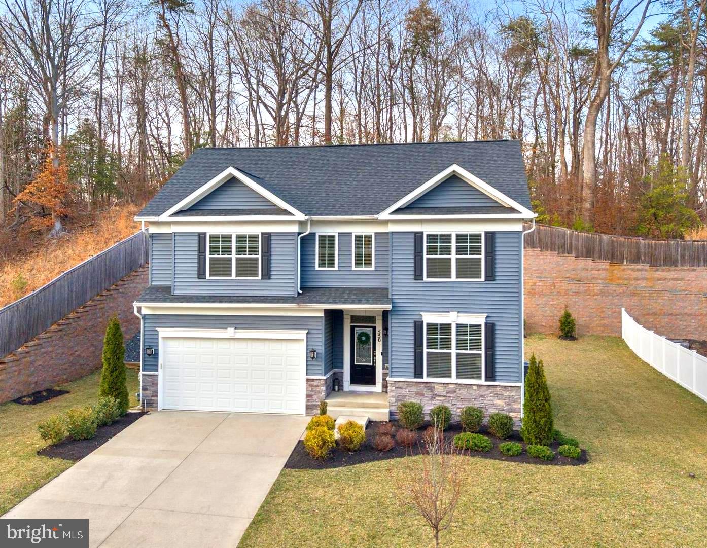 550 Broadneck Road Annapolis, MD 21409 - Photo 58 of 63 a front view of a house with garden