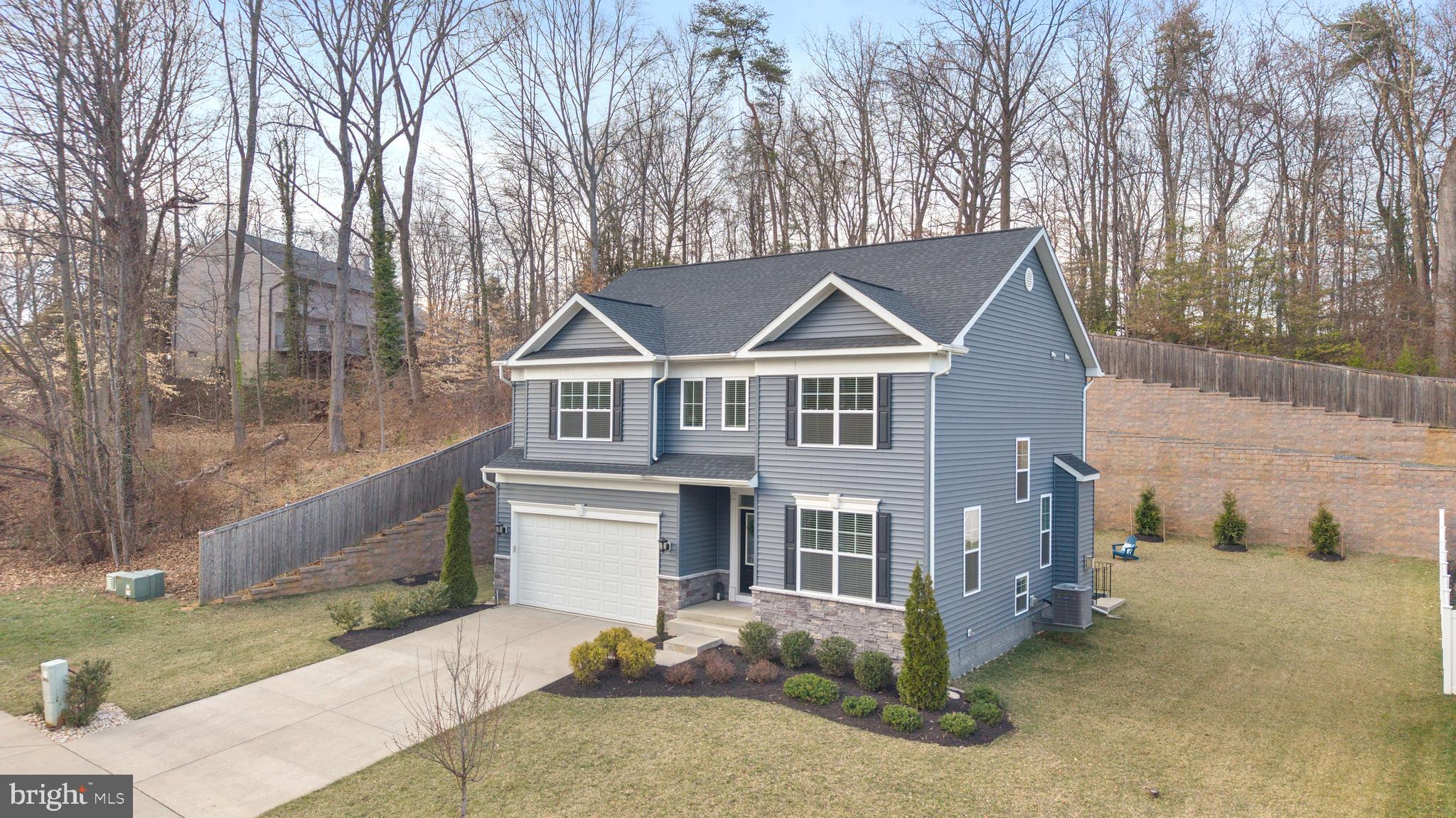 550 Broadneck Road Annapolis, MD 21409 - Photo 60 of 63 a front view of a house with a yard