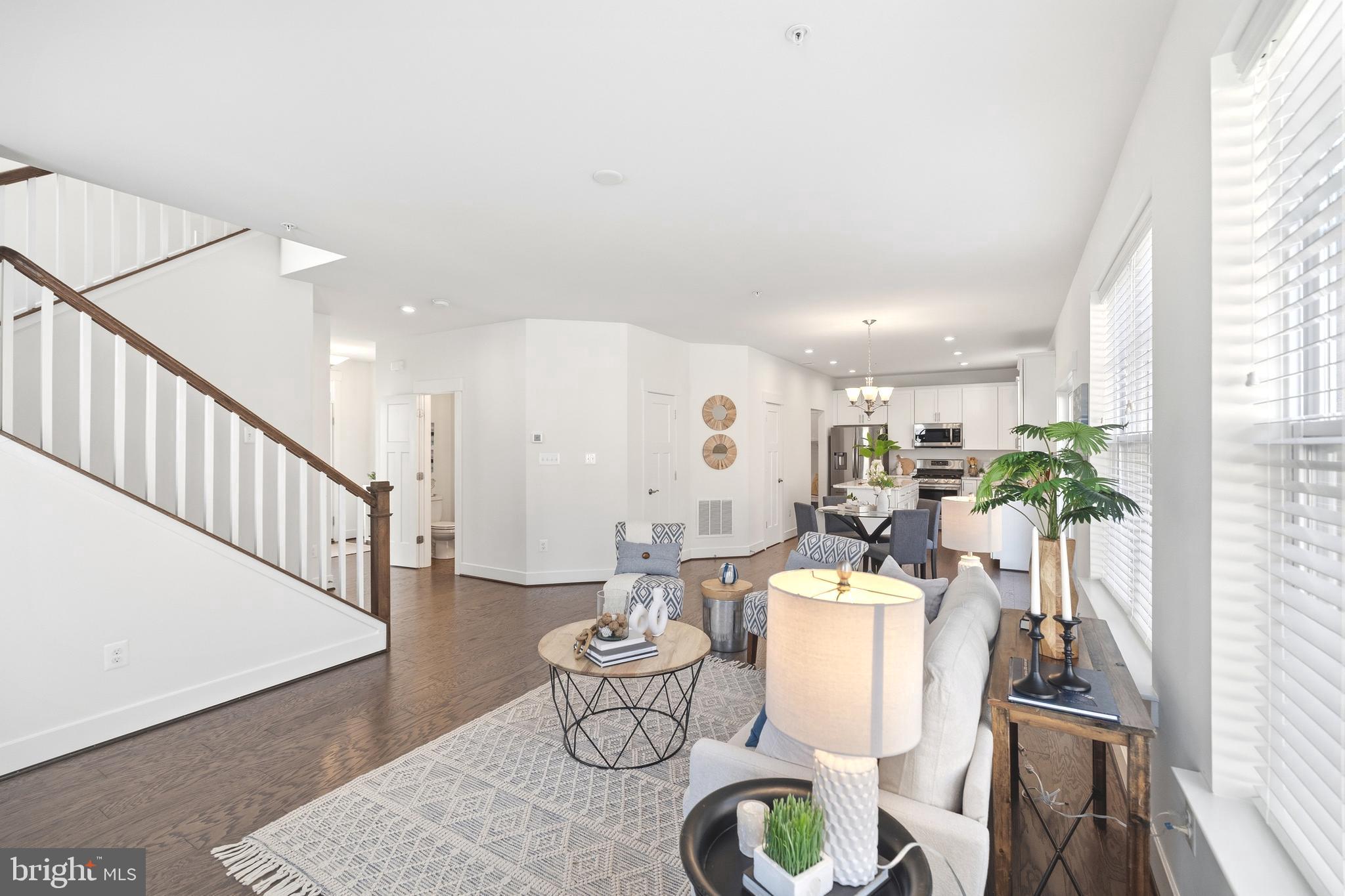 550 Broadneck Road Annapolis, MD 21409 - Photo 6 of 63 a dining room with furniture a rug and wooden floor