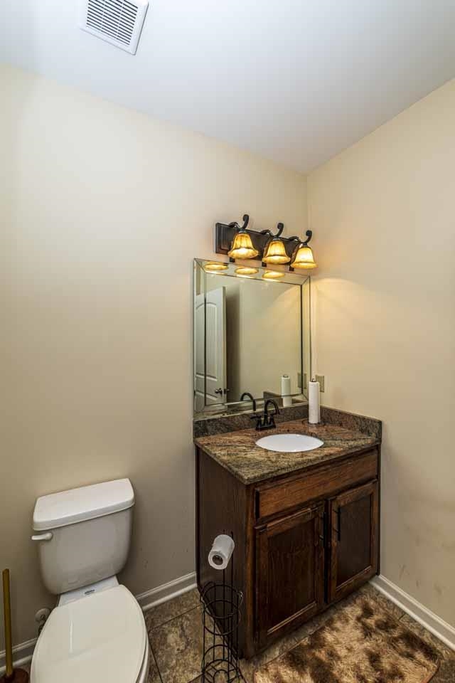 185 Belmont Road Mason, TN 38049 - Photo 16 of 40 a bathroom with a sink and a toilet