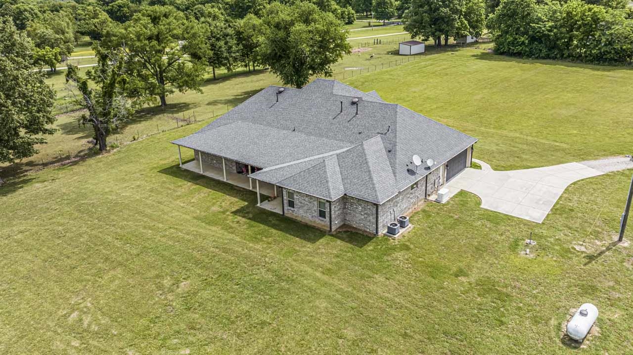 185 Belmont Road Mason, TN 38049 - Photo 34 of 40 a view of a swimming pool with a yard