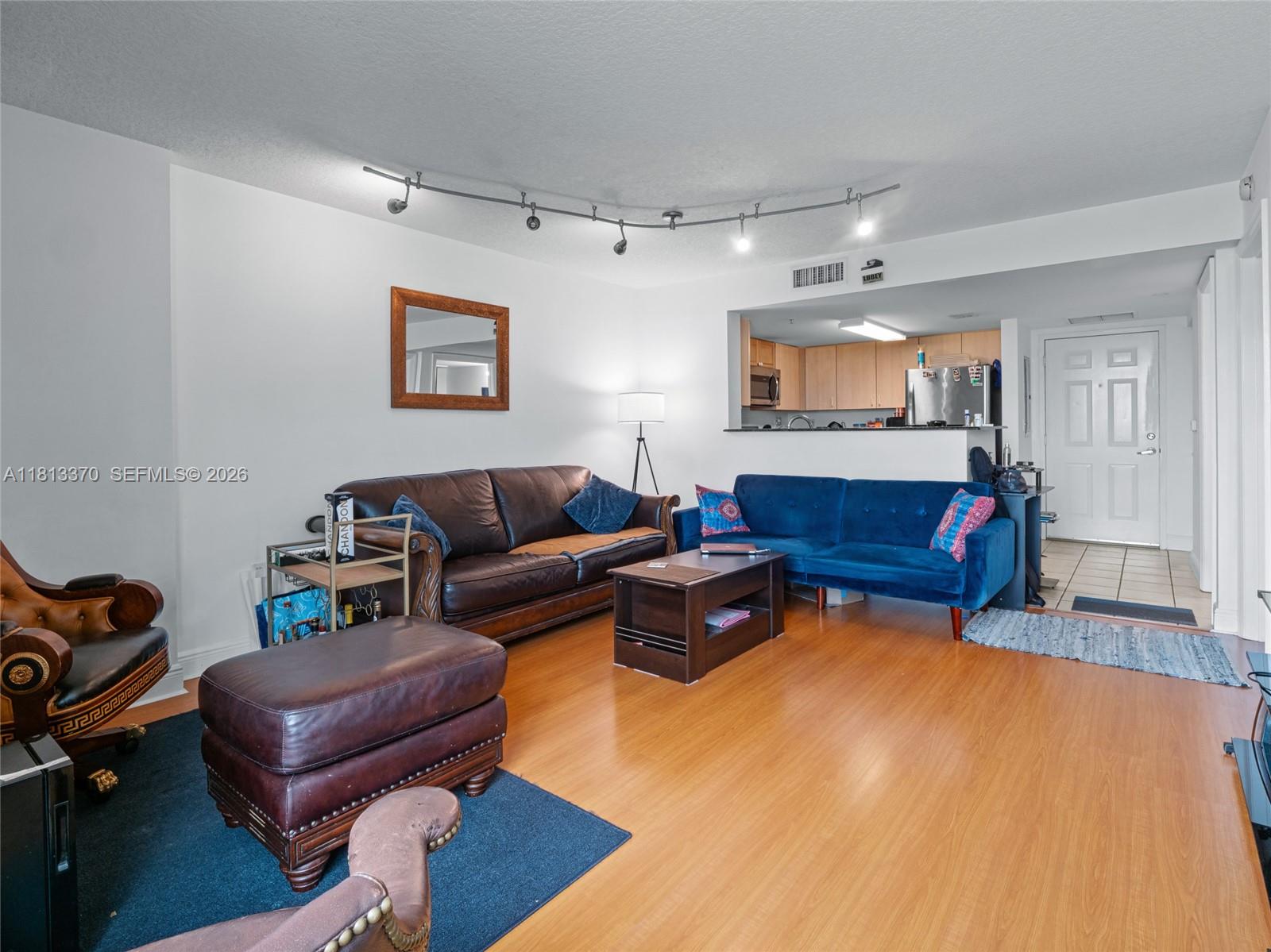 3000 Coral Way, Unit 815 Miami, FL 33145 - Photo 11 of 41 SPACIOUS LIVING AND DINING AREA