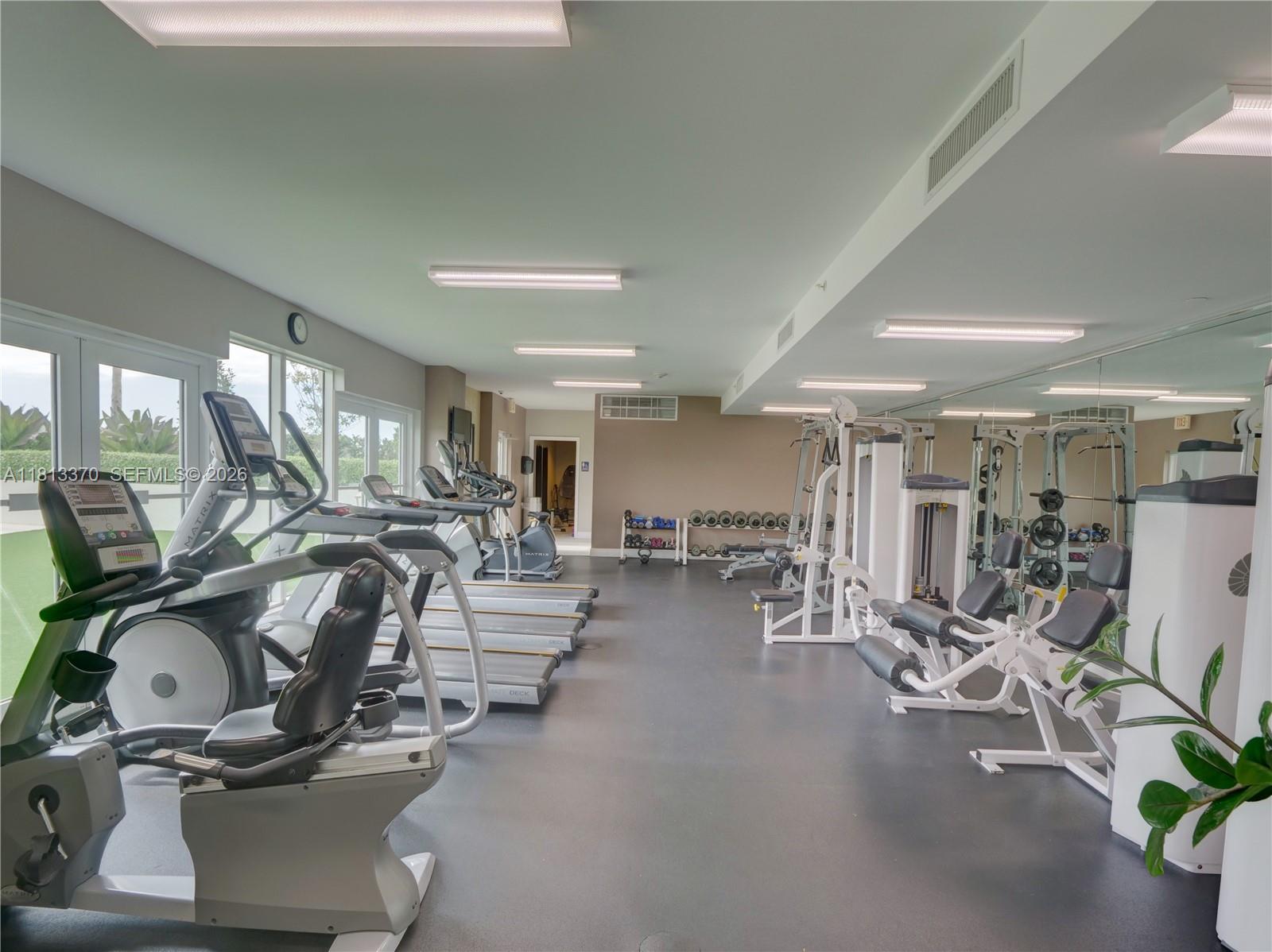 3000 Coral Way, Unit 815 Miami, FL 33145 - Photo 23 of 41 RENOVATED GYM OVERLOOKING THE LOVELY GARDEN