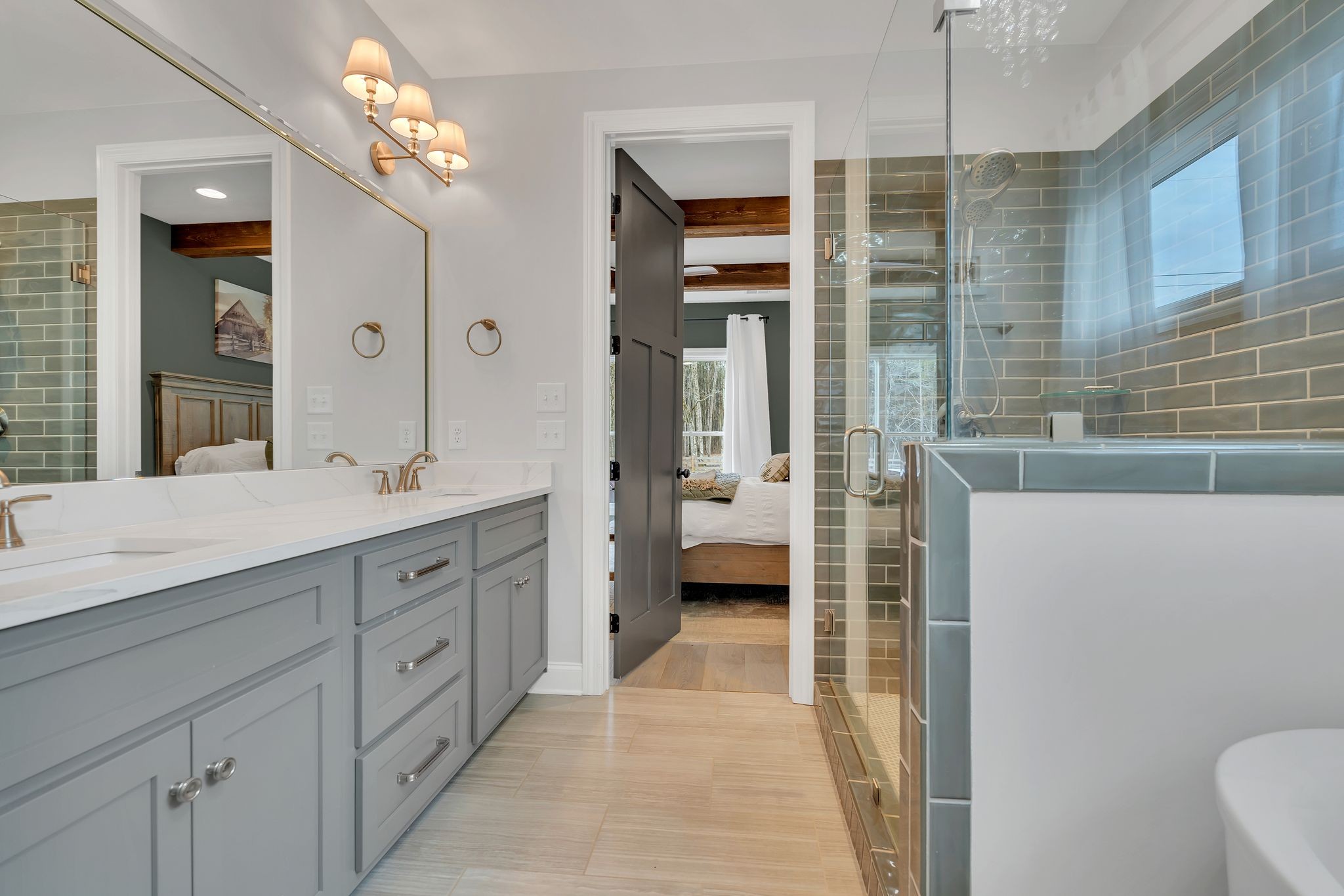 6655 Simmons Bluff Road Lebanon, TN 37090 - Photo 20 of 32 a spacious bathroom with a double vanity sink a mirror and a shower