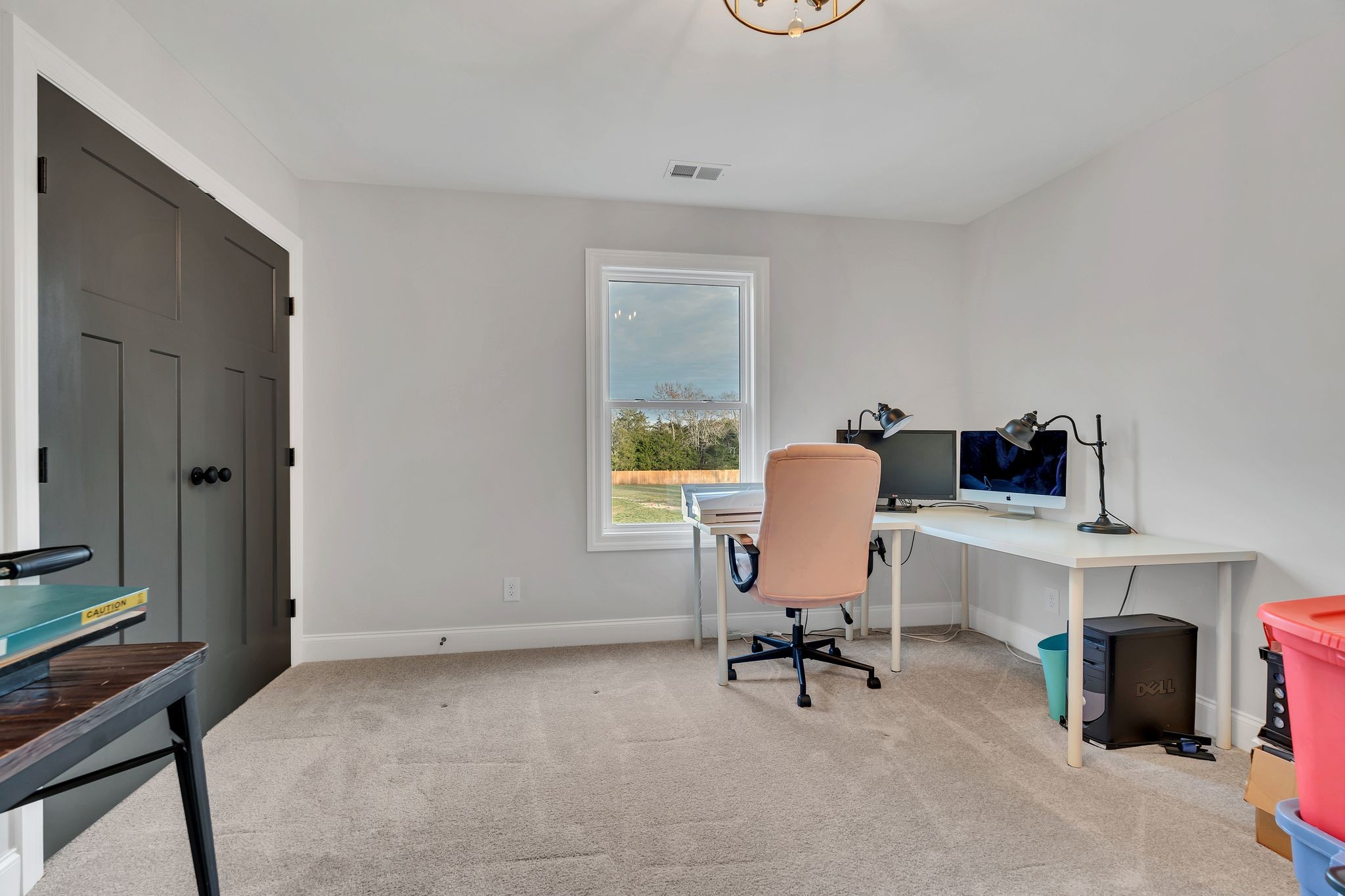 6655 Simmons Bluff Road Lebanon, TN 37090 - Photo 25 of 32 a view of a workspace with furniture and a window